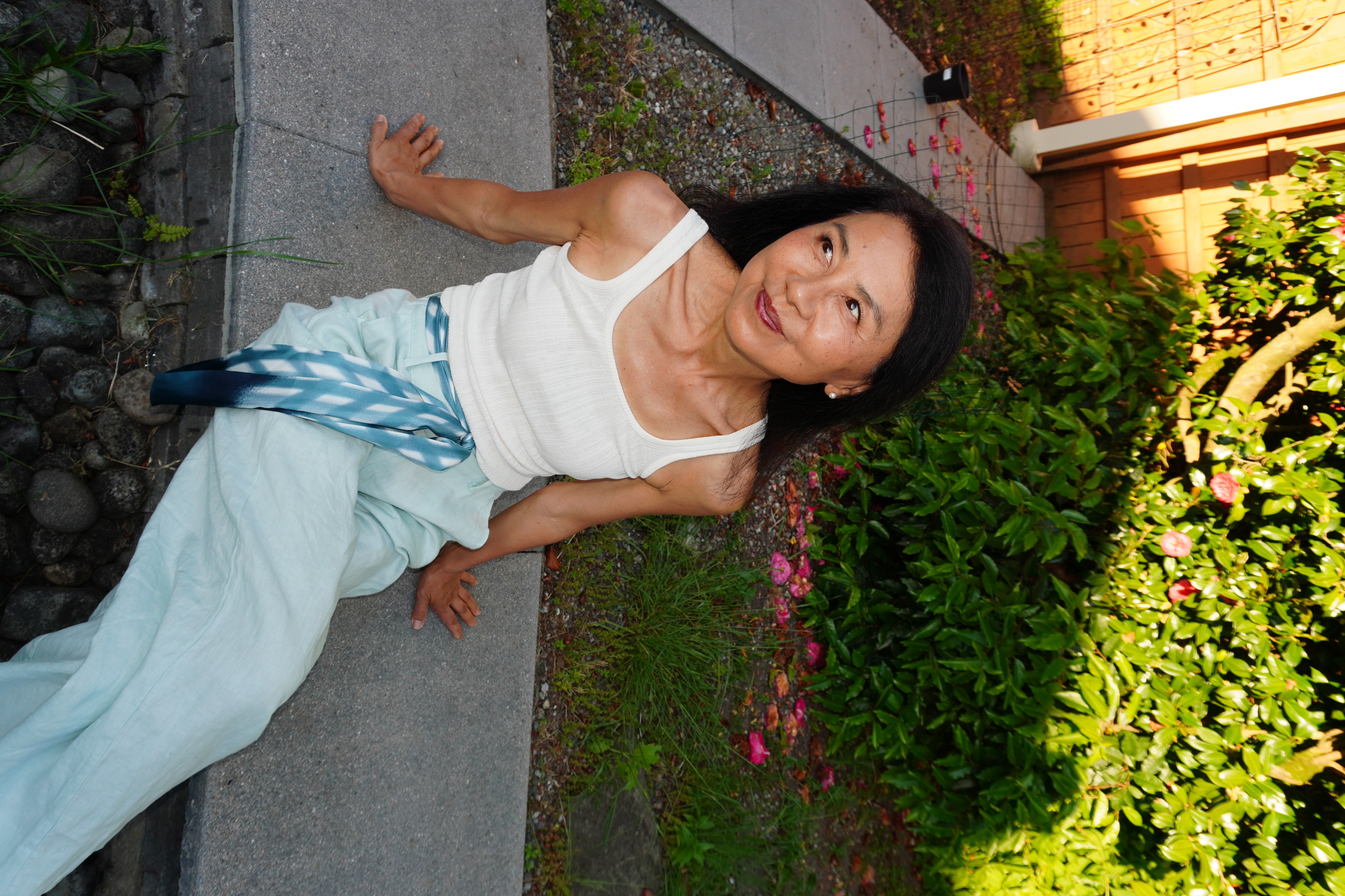 Janney sitting on the garden path in the evening